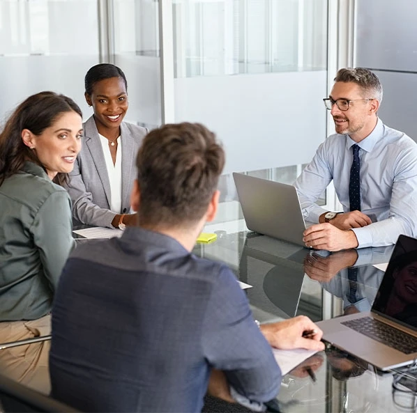Mediation team discussing in a meeting
